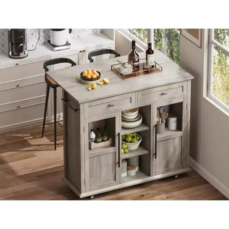 Îlot de cuisine mobile, chariot de cuisine roulant avec plateau à abattant élargi, 2 portes vitrées, porte-épices, porte-serviettes, rangement pour canettes et barre porte-serviettes