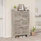 Meuble à chaussures autoportant avec 3 portes basculantes. Rangement dissimulé pour entrée, peut contenir plusieurs paires, style ferme avec crochets latéraux.