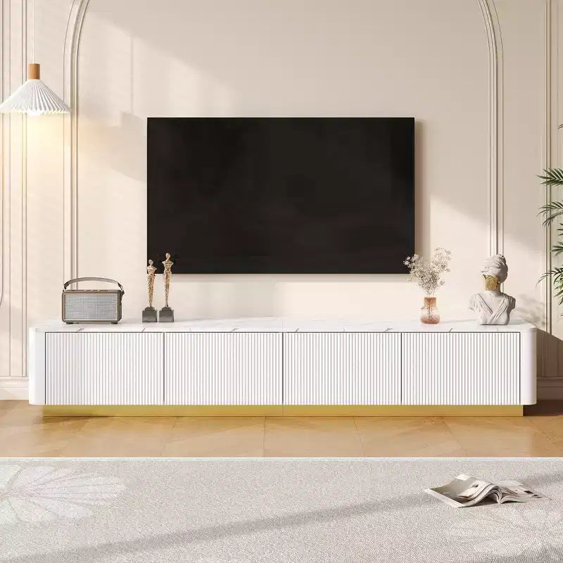 Meuble TV cannelé pour téléviseur de 85 pouces avec base dorée, meuble multimédia moderne avec 4 tiroirs, centre de divertissement avec profil incurvé