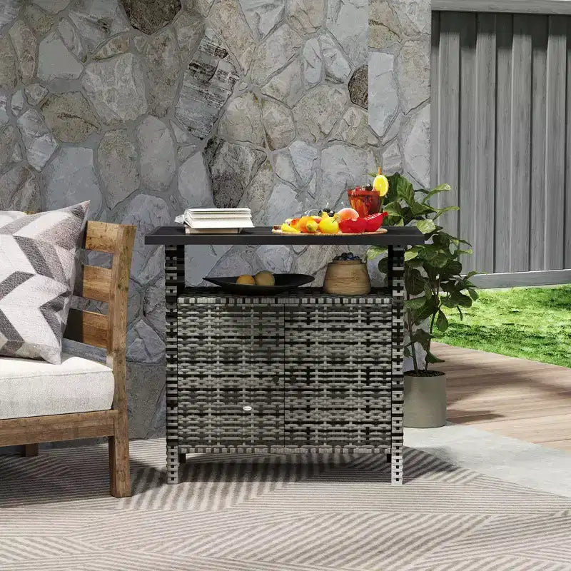 Armoire de rangement extérieure en osier avec deux portes et étagère pour le rangement de serviettes de piscine