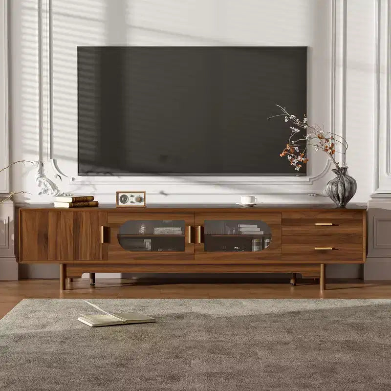 JVNOXK Meuble TV moderne de 78 pouces avec portes en verre intégrées, 2 tiroirs, pour téléviseurs jusqu'à 80 pouces, pieds en bois massif - Noyer
