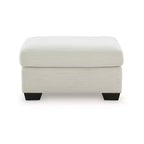 Pouf Ashley Ammon de la collection Signature Design, rembourrage en polyester cordé, ivoire