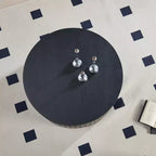 Table basse de rangement ronde moderne Caldrin avec compartiment caché GDFStudio