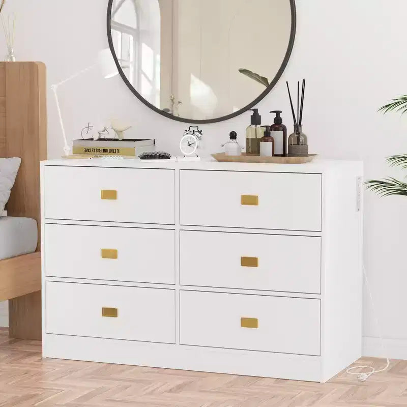 White six-drawer nursery dressing table/changing table - removable tabletop with changing mat, includes storage space for clothes and accessories.