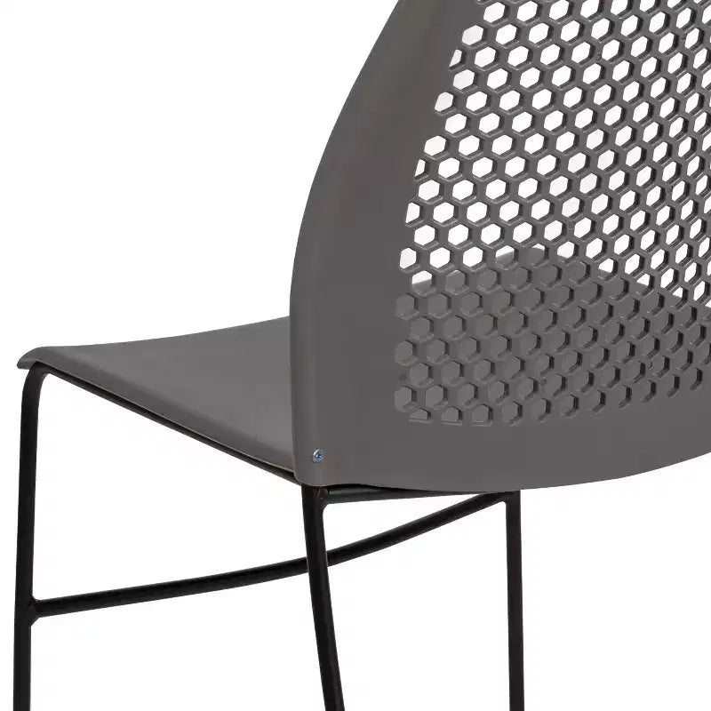 Chaise empilable Flash Furniture série HERCULES, capacité 300 kg, avec dossier aéré et piètement luge thermolaqué