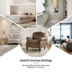Fauteuil Gianluigi en similicuir végane de transition avec clous décoratifs et pieds en bois massif pour la chambre et le salon | ART OF LIVING DESIGNS