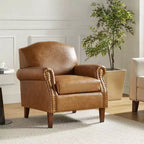 Fauteuil Gianluigi en similicuir végane de transition avec clous décoratifs et pieds en bois massif pour la chambre et le salon | ART OF LIVING DESIGNS