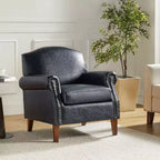 Fauteuil Gianluigi en similicuir végane de transition avec clous décoratifs et pieds en bois massif pour la chambre et le salon | ART OF LIVING DESIGNS
