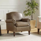 Fauteuil Gianluigi en similicuir végane de transition avec clous décoratifs et pieds en bois massif pour la chambre et le salon | ART OF LIVING DESIGNS
