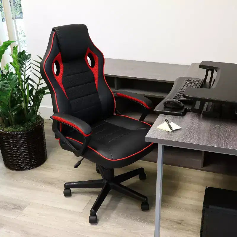 Chaise de bureau Elama dossier haut réglable en similicuir avec maille et tissu noir et garniture rouge