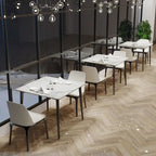 Table de salle à manger carrée 4 places en pierre frittée moderne à effet marbre