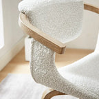 Fauteuil pivotant rembourré en bois